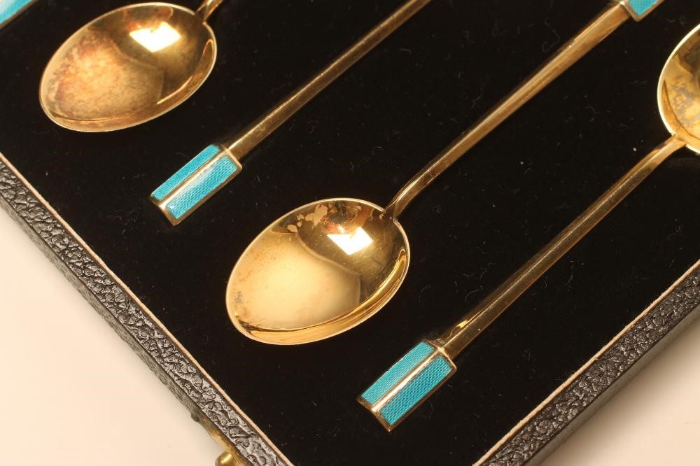 A SET OF SIX ART DECO SILVER GILT COFFEE SPOONS Image