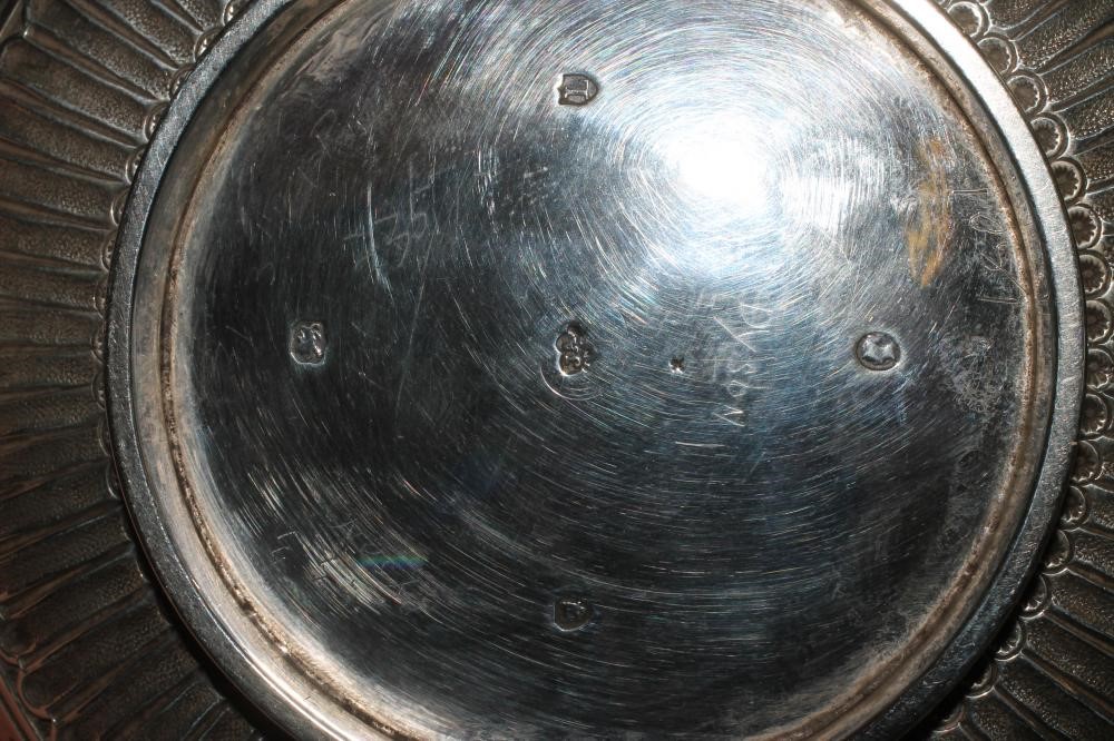 A BACHELOR'S LATE VICTORIAN THREE PIECE SILVER TEA SERVICE Image