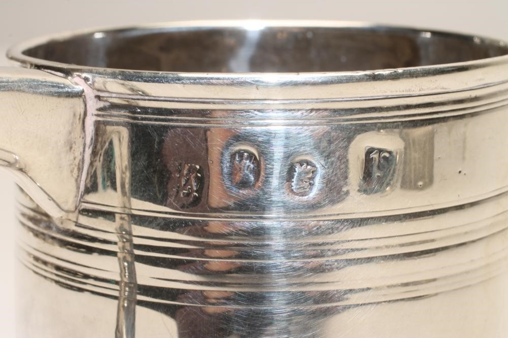 A QUEEN ANNE BRITANNIA STANDARD SILVER MUG Image