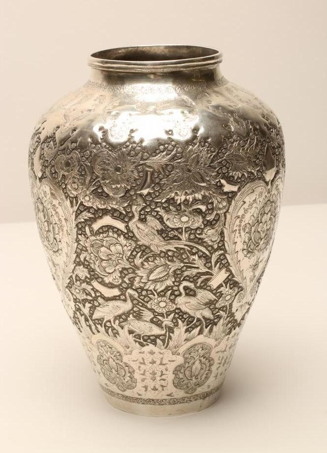 A CHINESE SILVER VASE of flared rounded cylindrical form with sloping shoulders Image