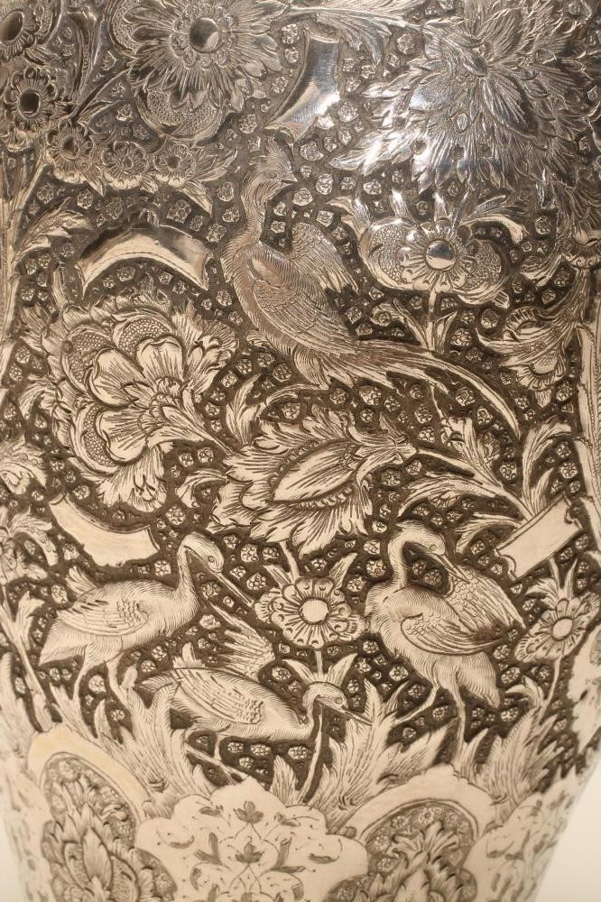 A CHINESE SILVER VASE of flared rounded cylindrical form with sloping shoulders Image