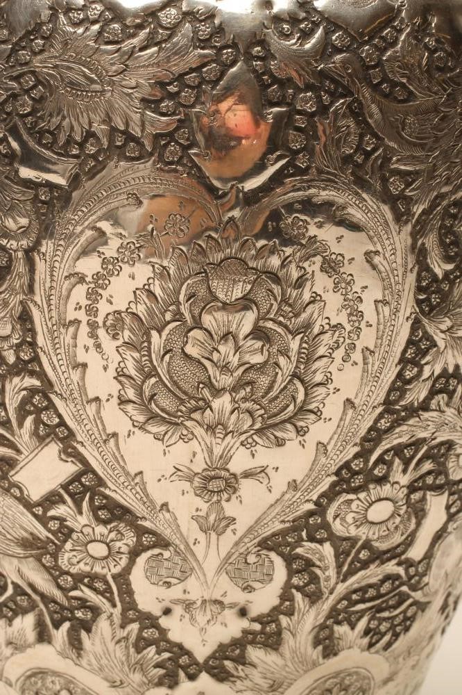 A CHINESE SILVER VASE of flared rounded cylindrical form with sloping shoulders Image