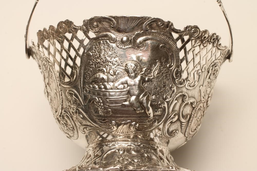 A LATE VICTORIAN SILVER BASKET retailed by William Moering Image