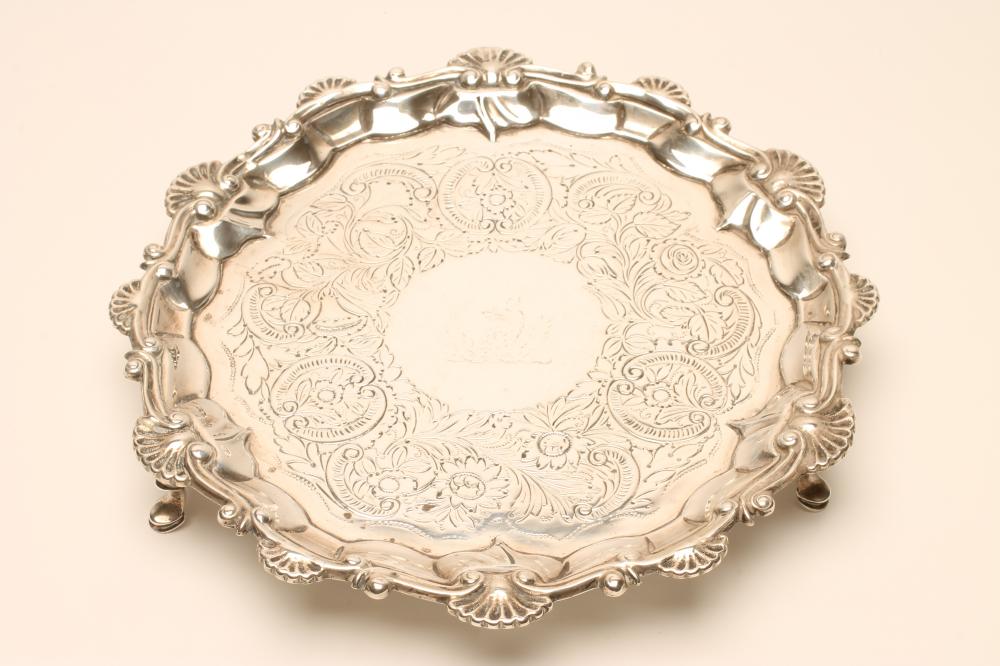 A GEORGE III SMALL SILVER SALVER Image