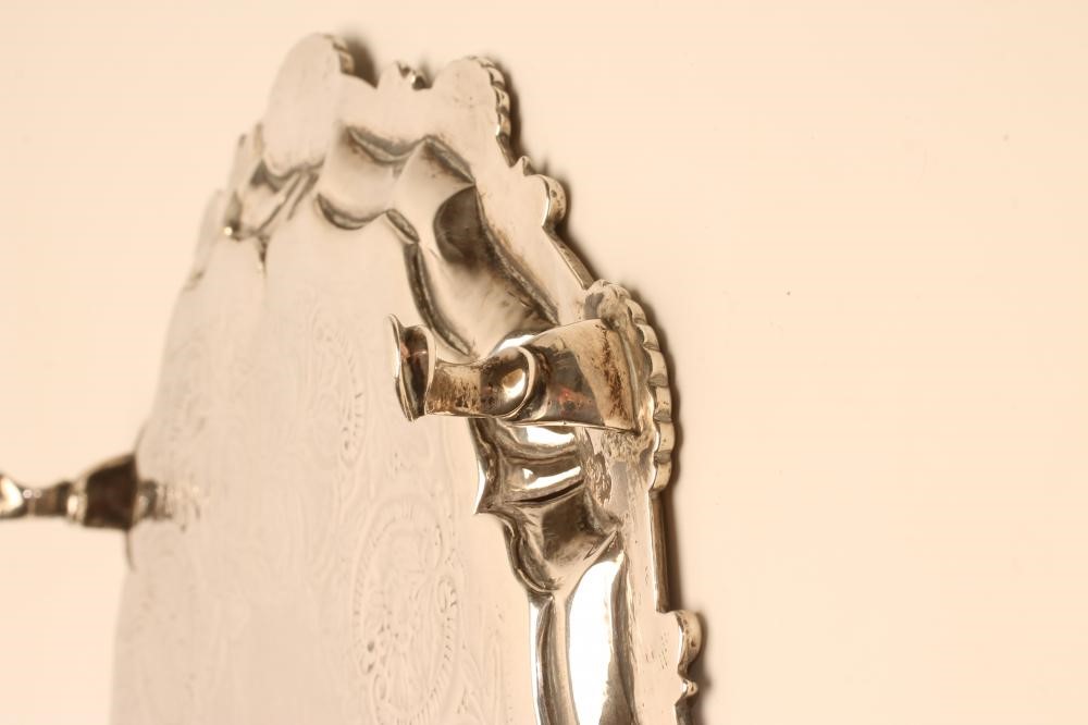 A GEORGE III SMALL SILVER SALVER Image