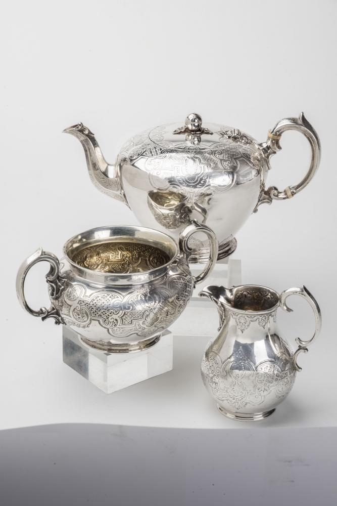 AN EARLY VICTORIAN SILVER THREE PIECE TEA SET Image