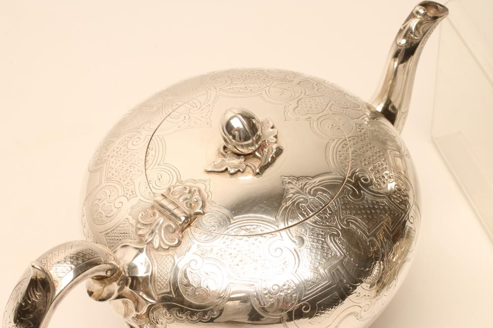 AN EARLY VICTORIAN SILVER THREE PIECE TEA SET Image