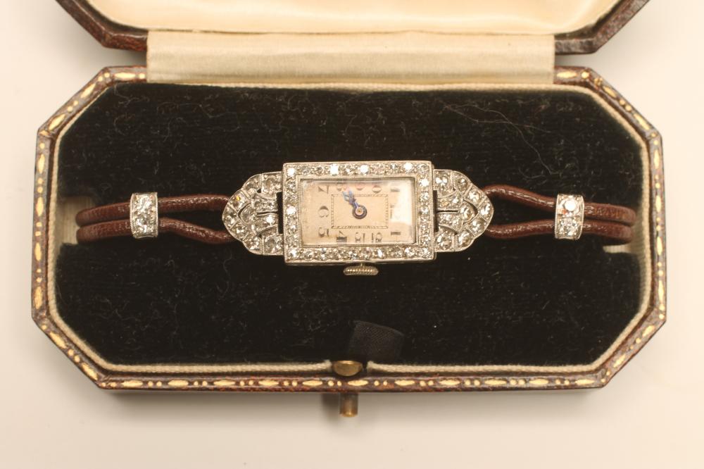 AN ART DECO DIAMOND AND PLATINUM COCKTAIL WATCH Image