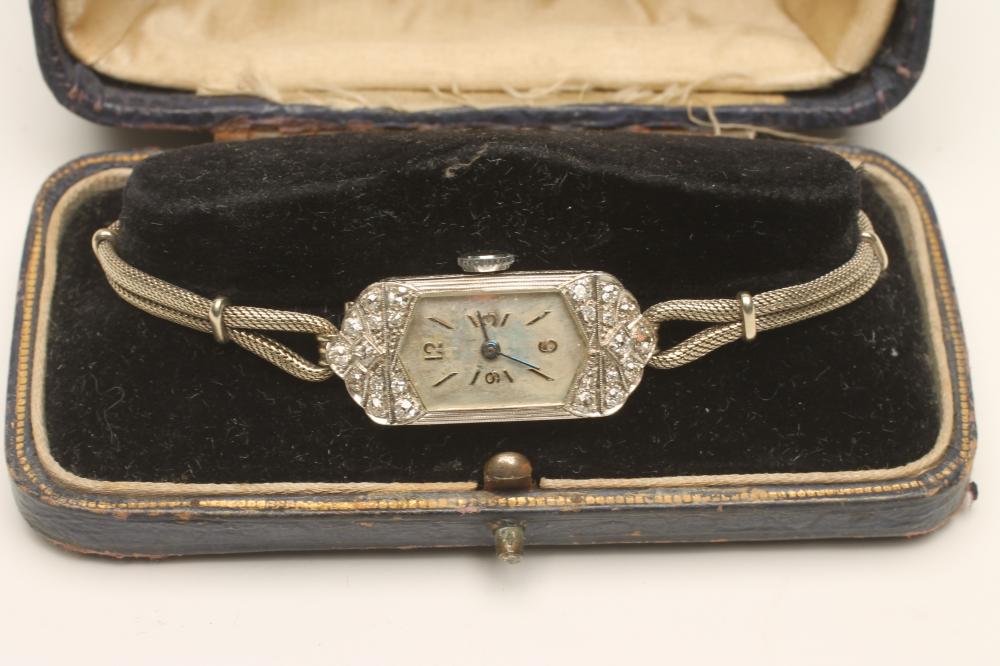 AN ART DECO DIAMOND AND PLATINUM COCKTAIL WATCH Image