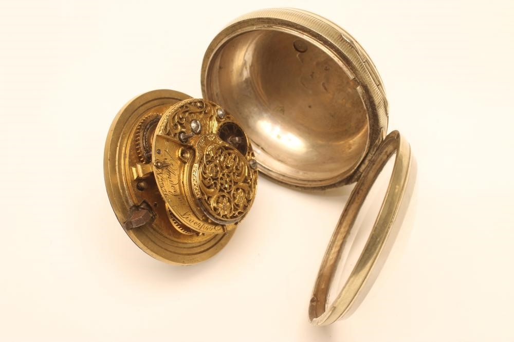 A GEORGE III SILVER VERGE POCKET WATCH Image