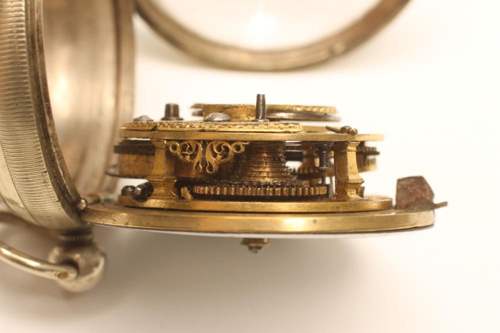 A GEORGE III SILVER VERGE POCKET WATCH Image