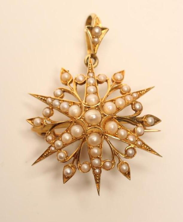 A VICTORIAN GOLD AND PEARL STAR BROOCH/PENDANT Image