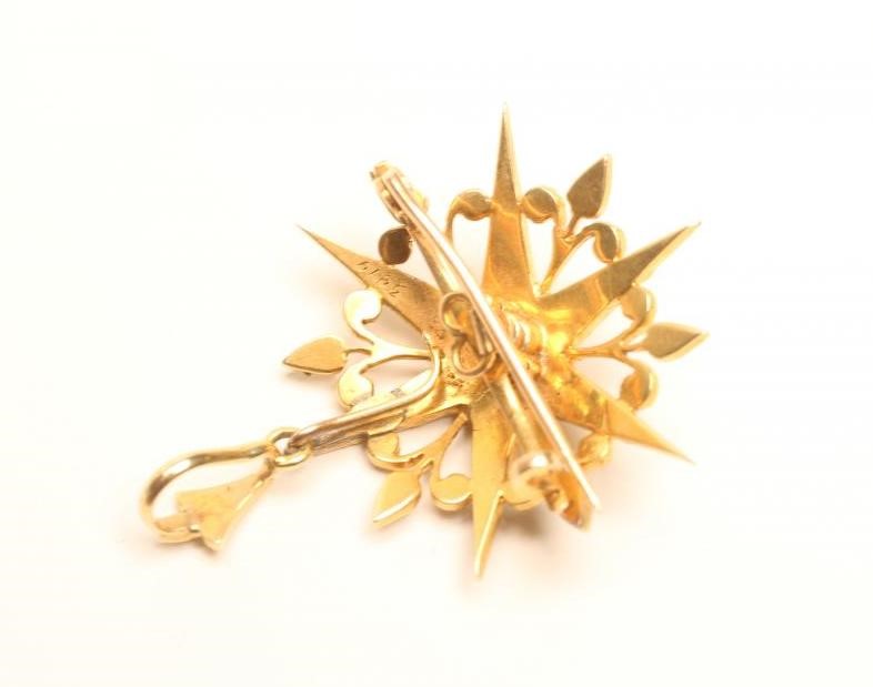 A VICTORIAN GOLD AND PEARL STAR BROOCH/PENDANT Image