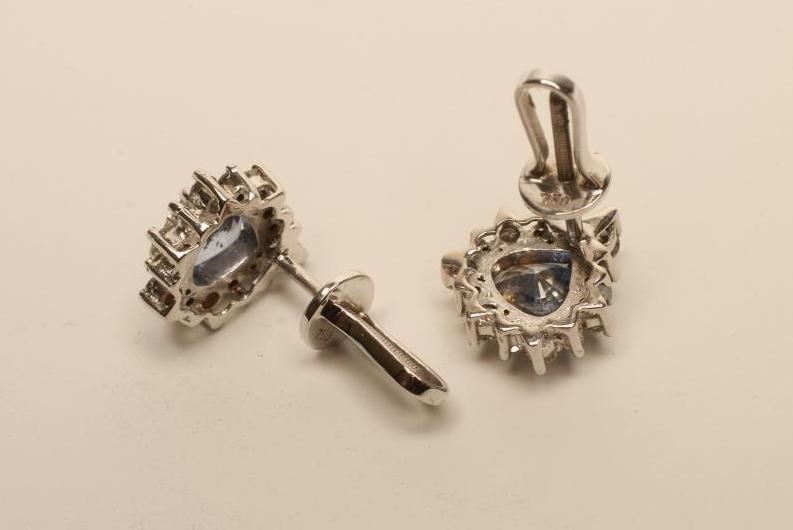 A PAIR OF PINK SAPPHIRE AND DIAMOND EAR STUDS Image