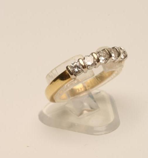 A FIVE STONE DIAMOND RING Image