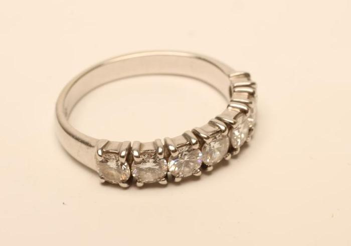 A DIAMOND HALF HOOP RING Image