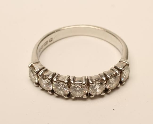 A DIAMOND HALF HOOP RING Image