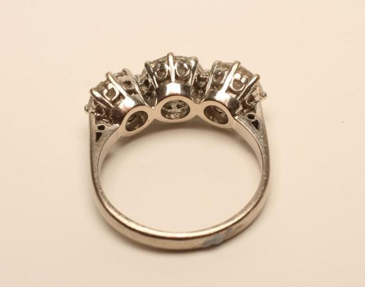 A THREE STONE DIAMOND RING Image