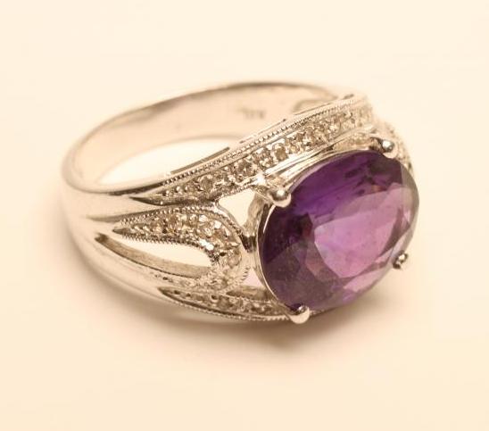 AN AMETHYST AND DIAMOND COCKTAIL RING Image