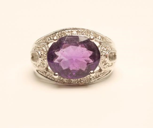 AN AMETHYST AND DIAMOND COCKTAIL RING Image