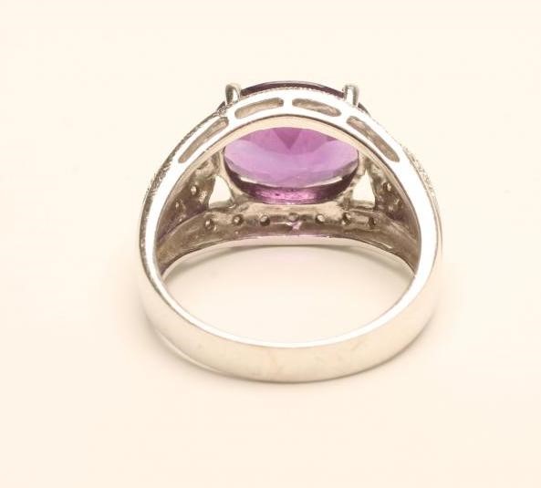 AN AMETHYST AND DIAMOND COCKTAIL RING Image