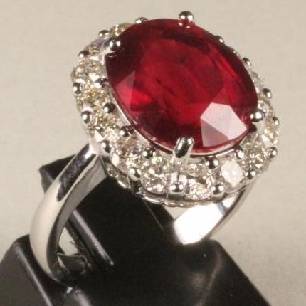 A RUBY AND DIAMOND CLUSTER RING Image