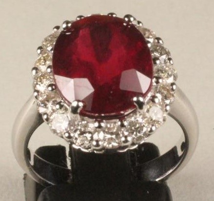 A RUBY AND DIAMOND CLUSTER RING Image