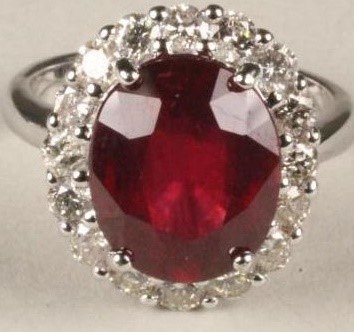 A RUBY AND DIAMOND CLUSTER RING Image