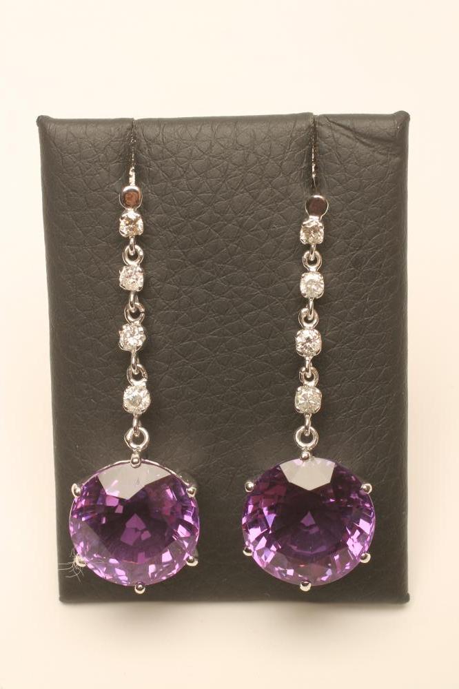 A PAIR OF AMETHYST AND DIAMOND DROP EAR STUDS Image