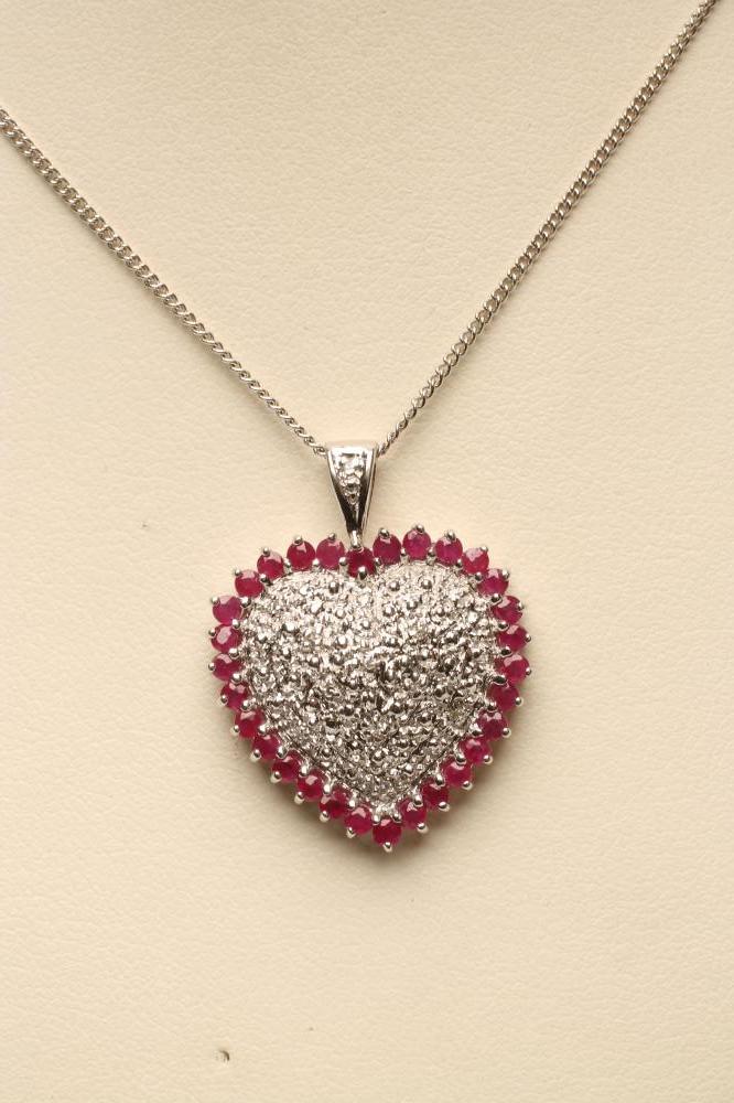 A RUBY AND DIAMOND HEART PENDANT Image