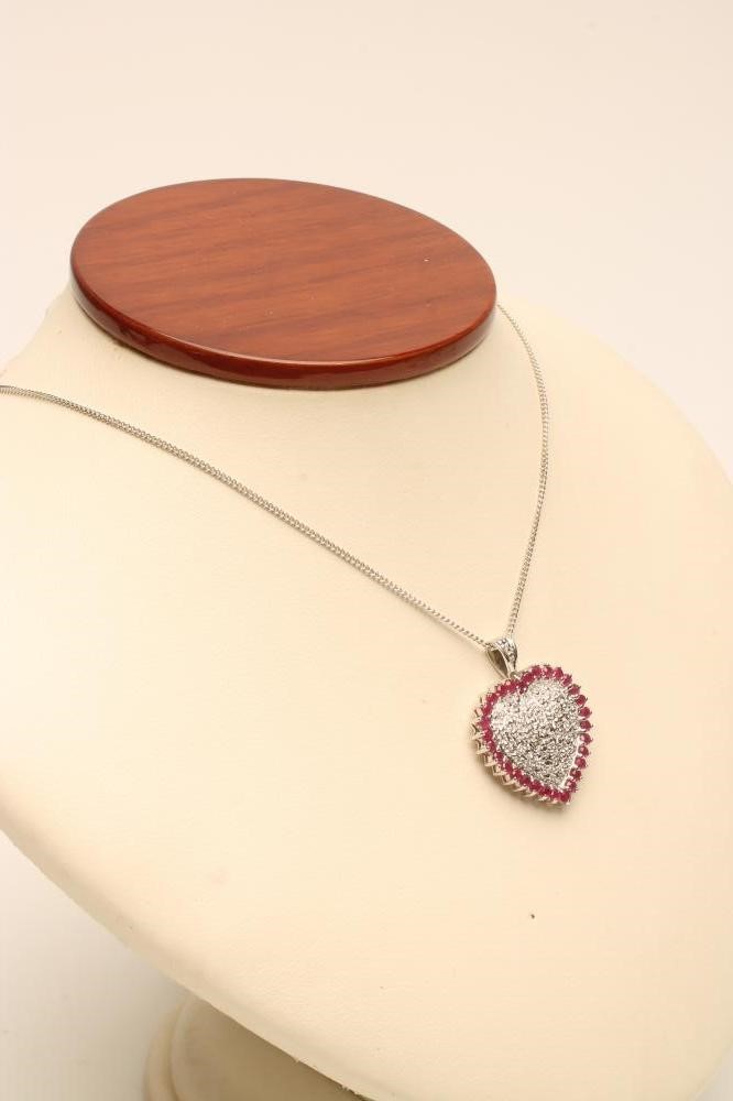 A RUBY AND DIAMOND HEART PENDANT Image