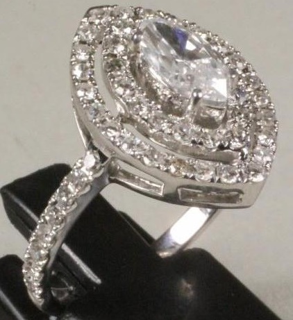A DIAMOND CLUSTER RING Image