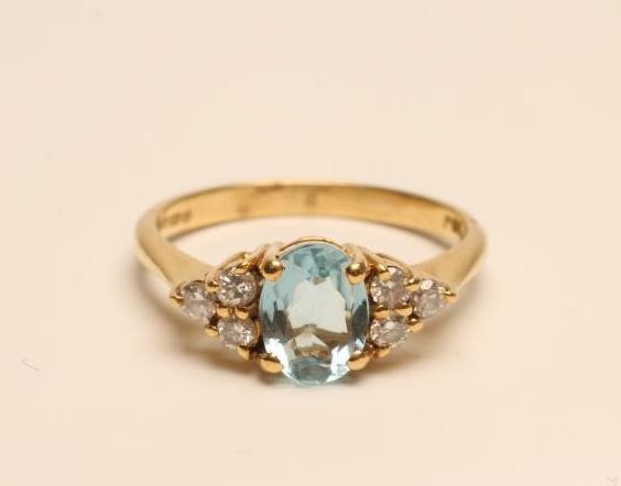 AN AQUAMARINE AND DIAMOND DRESS RING Image