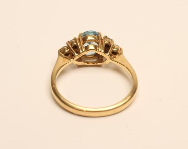 AN AQUAMARINE AND DIAMOND DRESS RING Image