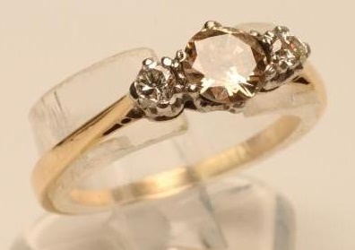 A THREE STONE DIAMOND RING Image