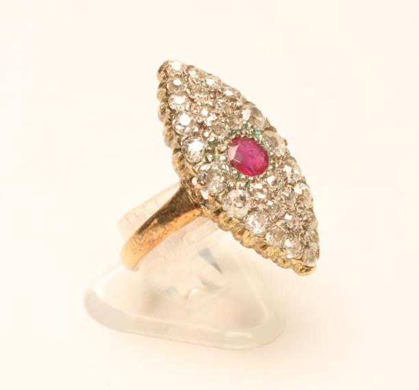 A DIAMOND AND RUBY PLAQUE RING Image
