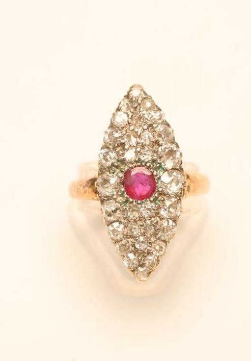 A DIAMOND AND RUBY PLAQUE RING Image
