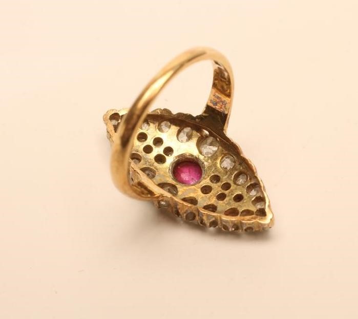 A DIAMOND AND RUBY PLAQUE RING Image