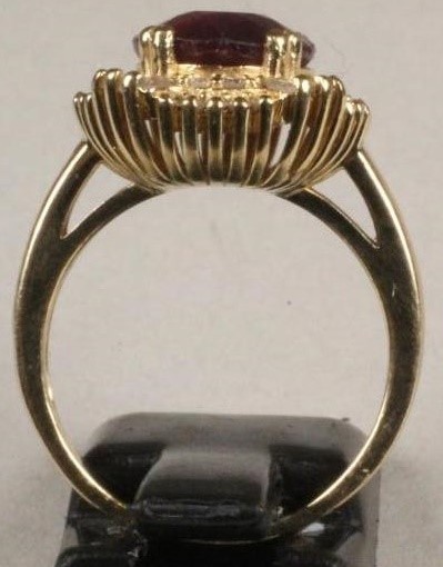 A RUBY AND DIAMOND CLUSTER RING Image