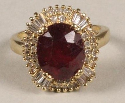 A RUBY AND DIAMOND CLUSTER RING Image
