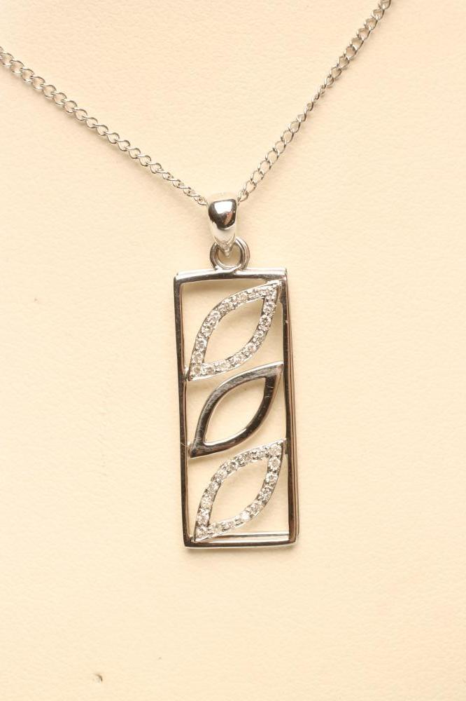 A 9CT WHITE GOLD DOUBLE PENDANT of oblong form Image