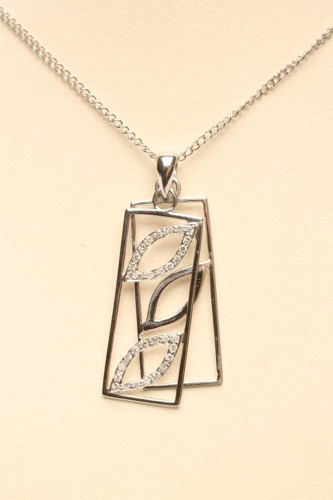 A 9CT WHITE GOLD DOUBLE PENDANT of oblong form Image