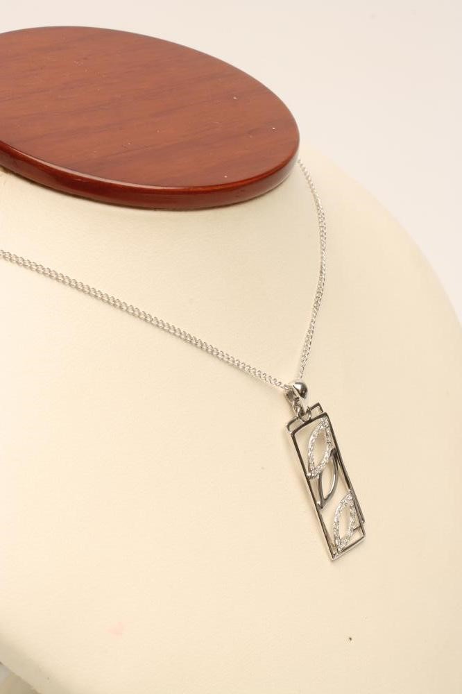 A 9CT WHITE GOLD DOUBLE PENDANT of oblong form Image