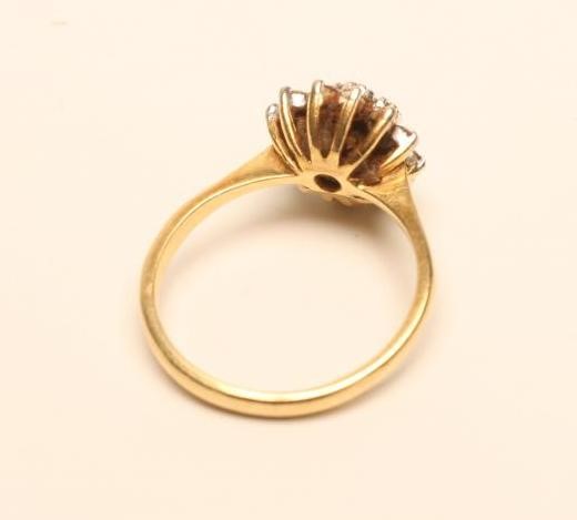 A DIAMOND CLUSTER RING Image