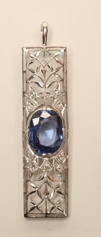 A SAPPHIRE AND DIAMOND PENDANT Image