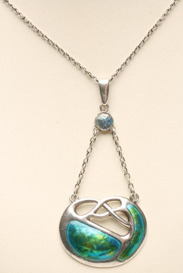 AN EDWARDIAN ARTS AND CRAFTS SILVER AND ENAMEL PENDANT Image