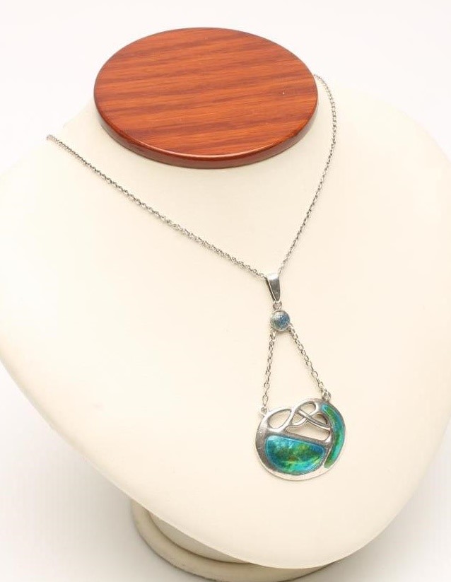 AN EDWARDIAN ARTS AND CRAFTS SILVER AND ENAMEL PENDANT Image