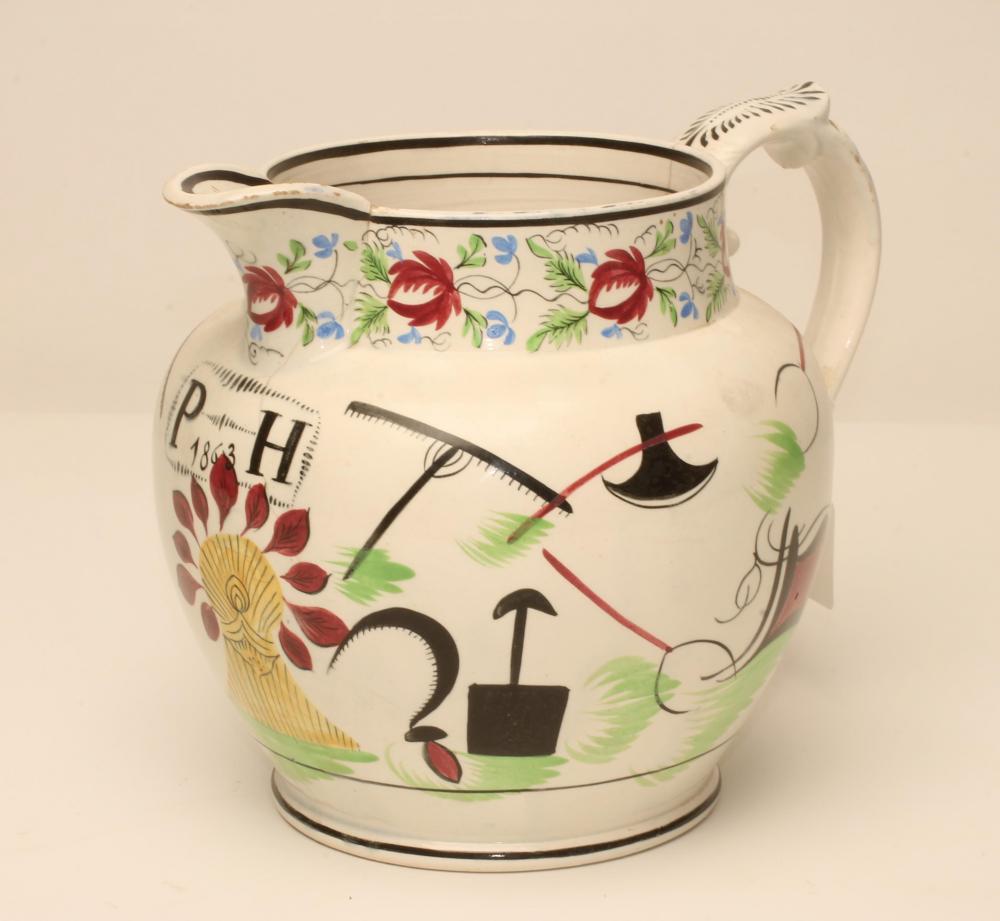 A DOCUMENTARY PEARLWARE DUTCH SHAPE JUG Image