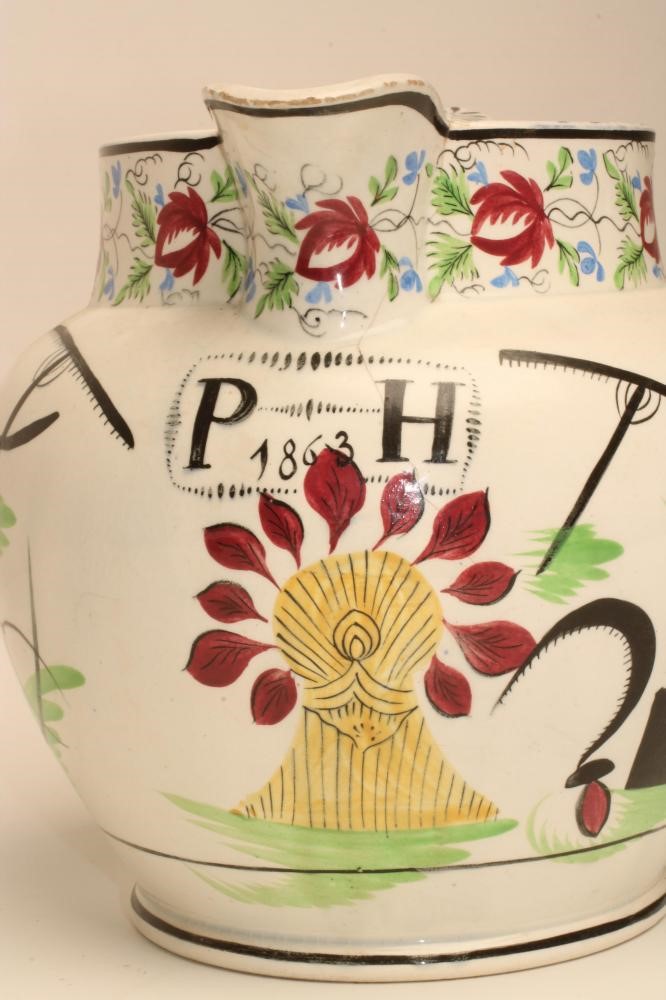 A DOCUMENTARY PEARLWARE DUTCH SHAPE JUG Image