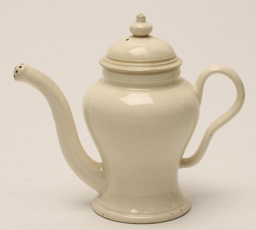 A CREAMWARE ROSEWATER SPRINKLER AND COVER Image